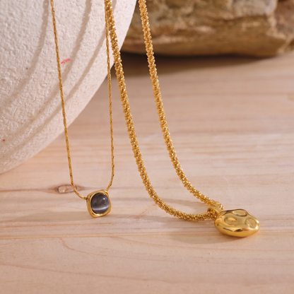 Liora Layered Stone Necklace draped chain detail with stone and pebble pendant