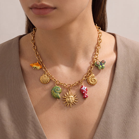 Maris-Charm-Cluster-Necklace Gold — on model