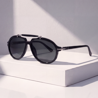 Monterey Pilot Sunglasses in Black on a white plinth