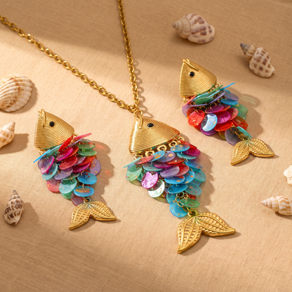 Odessa multicolor shell fish necklace and earrings styled with seashells