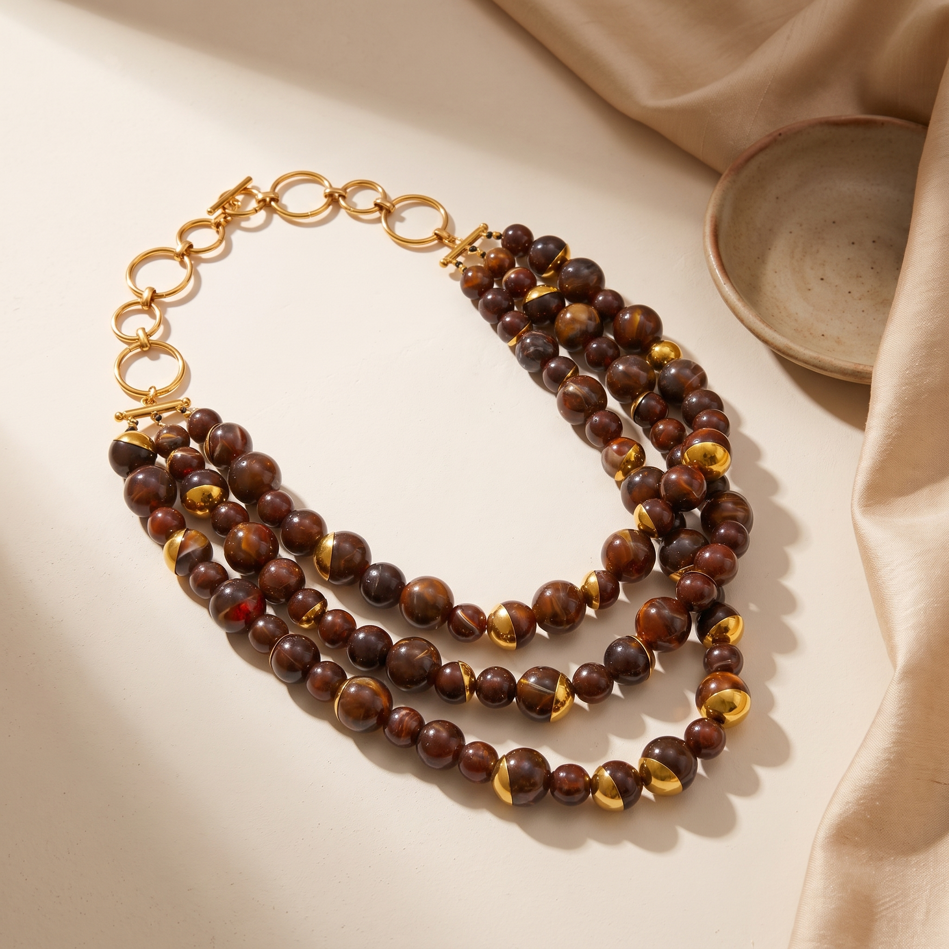 Positano-Beaded-Pearl-Necklace Tortoise — flatlay 1