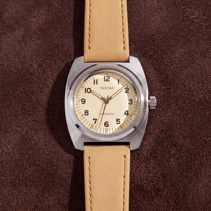 Rhodes Genuine Leather Watch flat lay on brown suede, seen from above