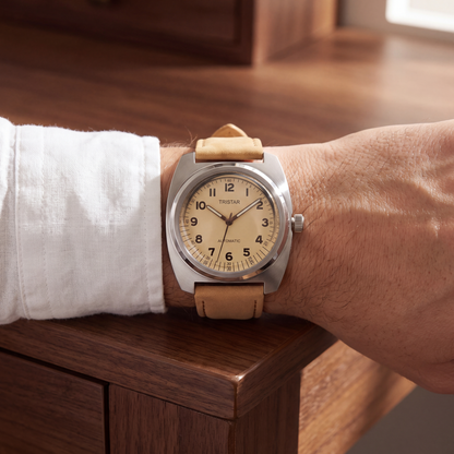 Rhodes Genuine Leather Watch worn on the wrist at a walnut desk