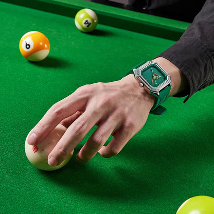 Rowan billiards dial sport watch with green rubber strap worn at a pool table