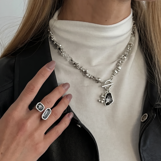 Sable smoke-crystal necklace and ring set, on model