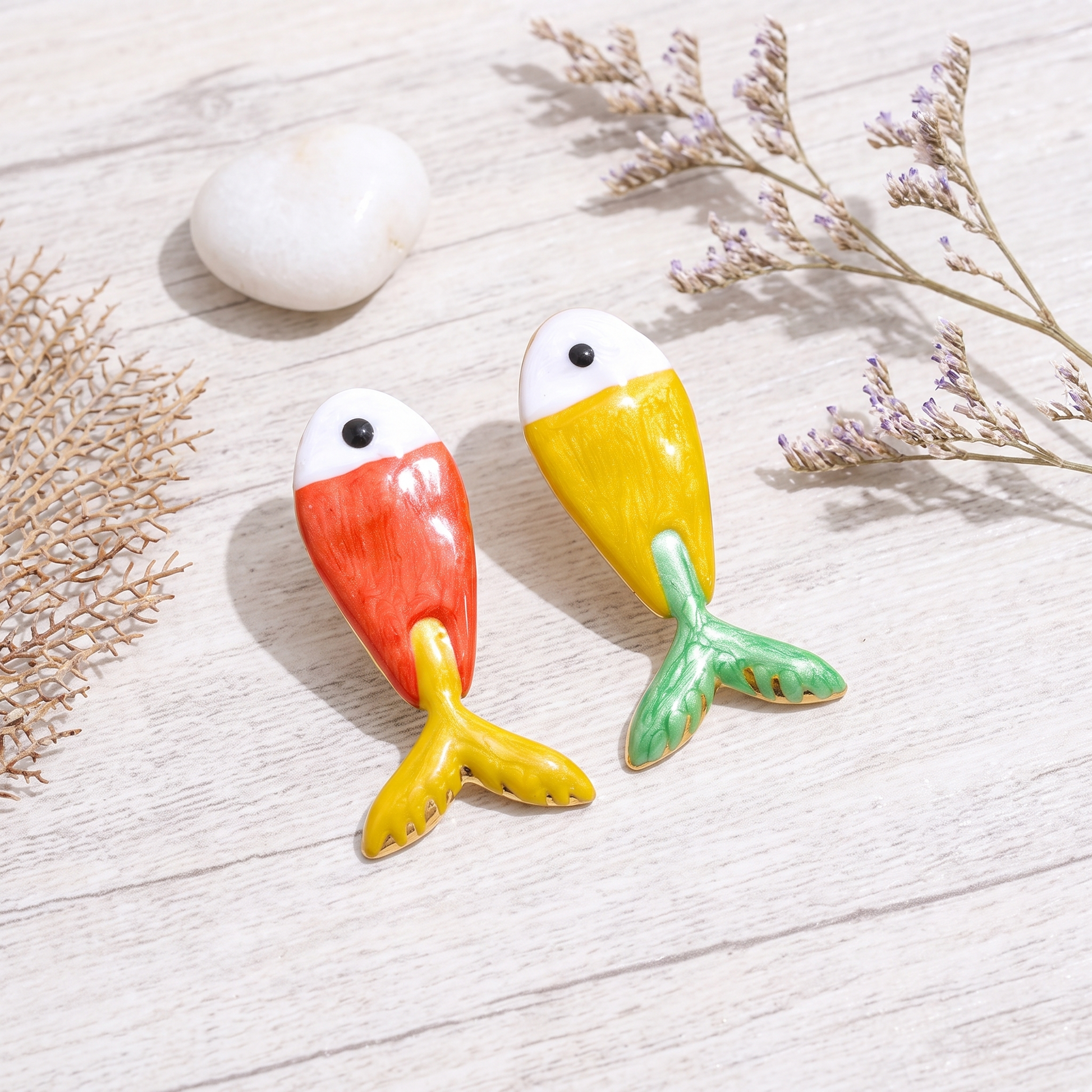 Sienna Enamel Fish Stud Earrings in Red & Yellow — styled flat-lay
