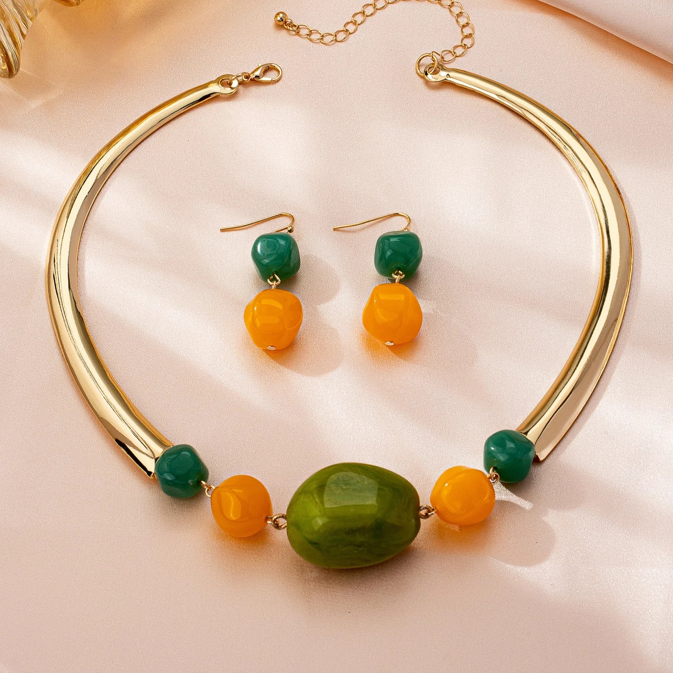 Sorrento beaded collar necklace and earrings flat lay